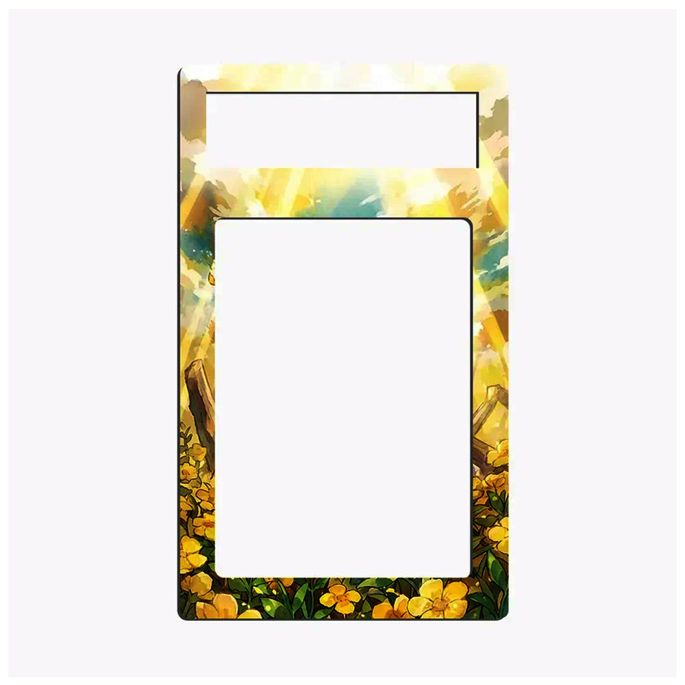 A decorative picture frame or magnet backing with a colorful landscape border. The top section features a bright yellow and white sky with sun rays, while the bottom is decorated with yellow flowers and green leaves.