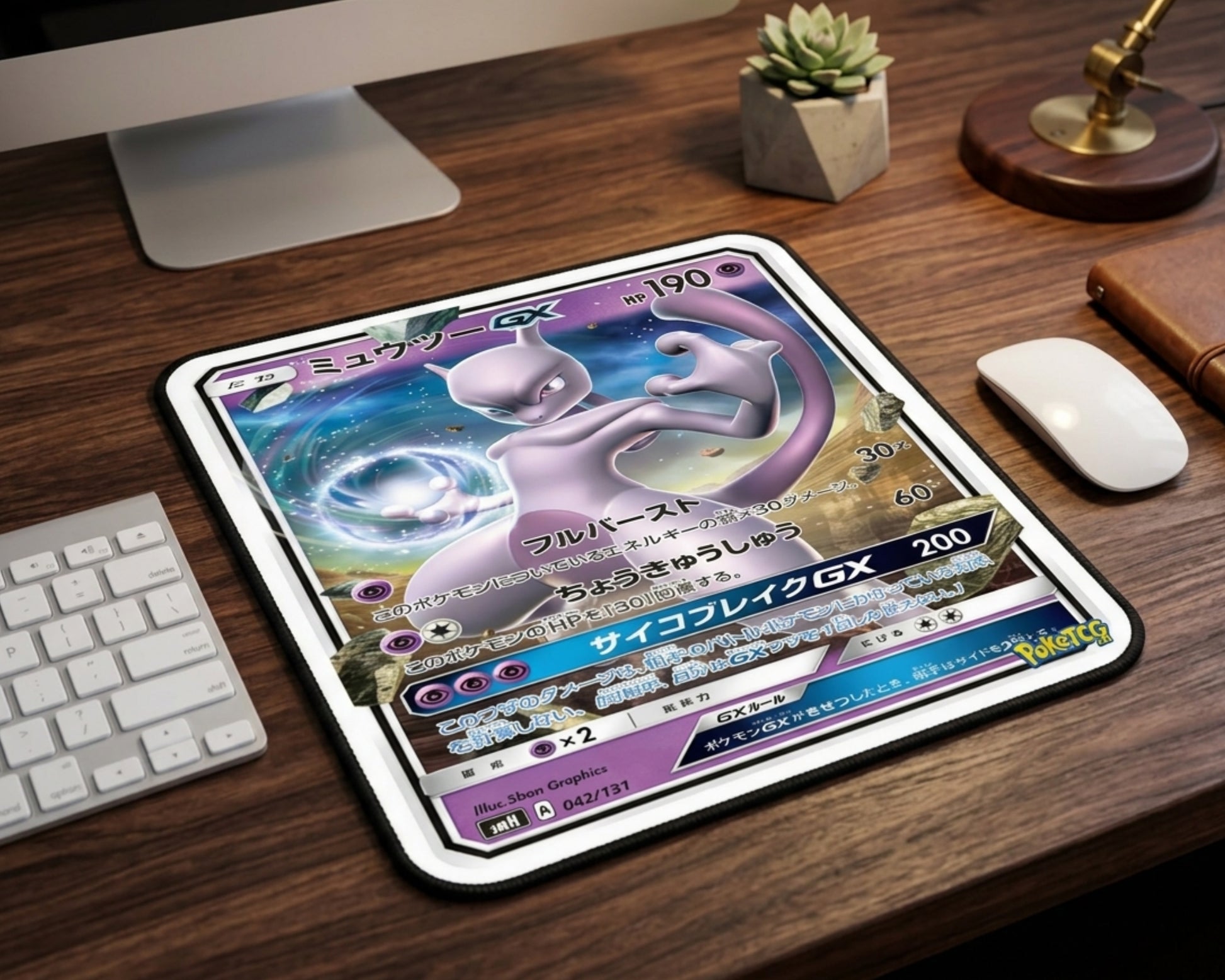 Mewtwo GX Pokémon trading card inspired mouse pad on a wooden desk setup with iMac, white keyboard, wireless mouse, and modern workspace aesthetic