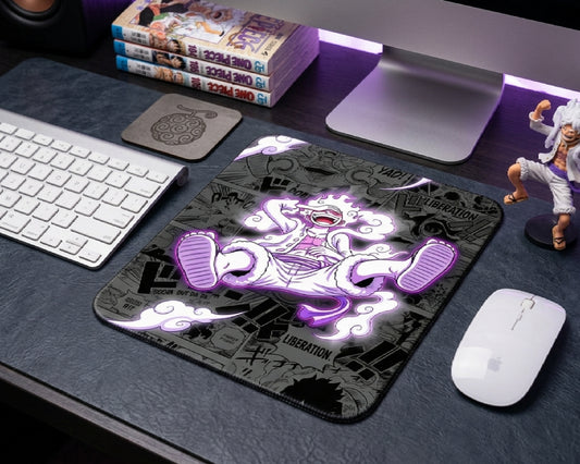 Modern desktop setup with Gear 5 Luffy anime mouse pad, white keyboard and mouse, purple ambient lighting, One Piece manga volumes, and premium anime gaming aesthetic