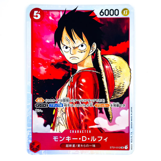 A character trading card featuring Monkey D. Luffy from One Piece, with a red and pink background, Japanese text, and card stats including 6000 and 5.