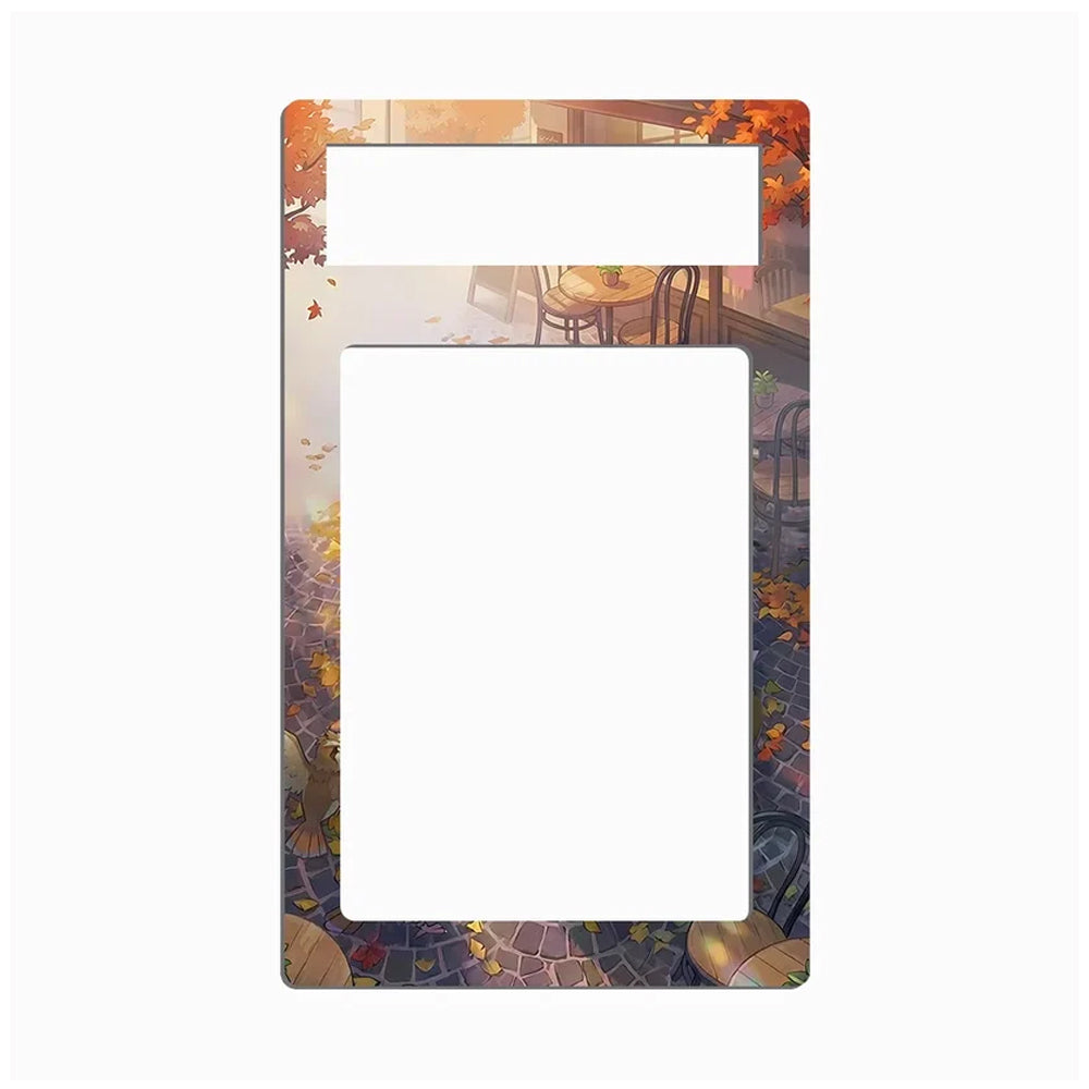 A rectangular decorative plate or sign with rounded corners, featuring a printed autumn cafe scene with orange leaves, tables, chairs, and a mosaic stone floor. The top and center areas are blank white spaces, likely for customization or text placement, set against a solid white background.