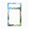 A rectangular acrylic or glass magnetic money clip frame with a colorful anime-style forest illustration, featuring a top slot for a coin and a large central cutout, shown on a plain white background.