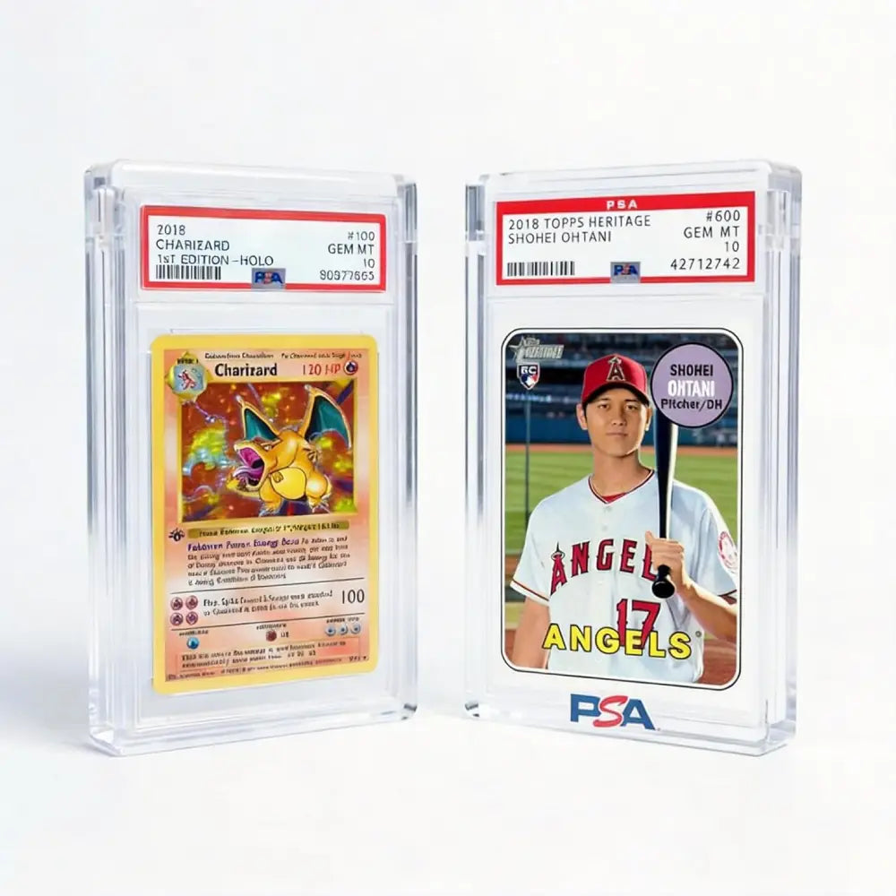 Two PSA-graded 2018 Topps baseball cards in clear plastic holders, shown side by side on a white background. The left card is a Charizard Holo Gem Mint, and the right card is a Shogi Dattani Gem Mint.