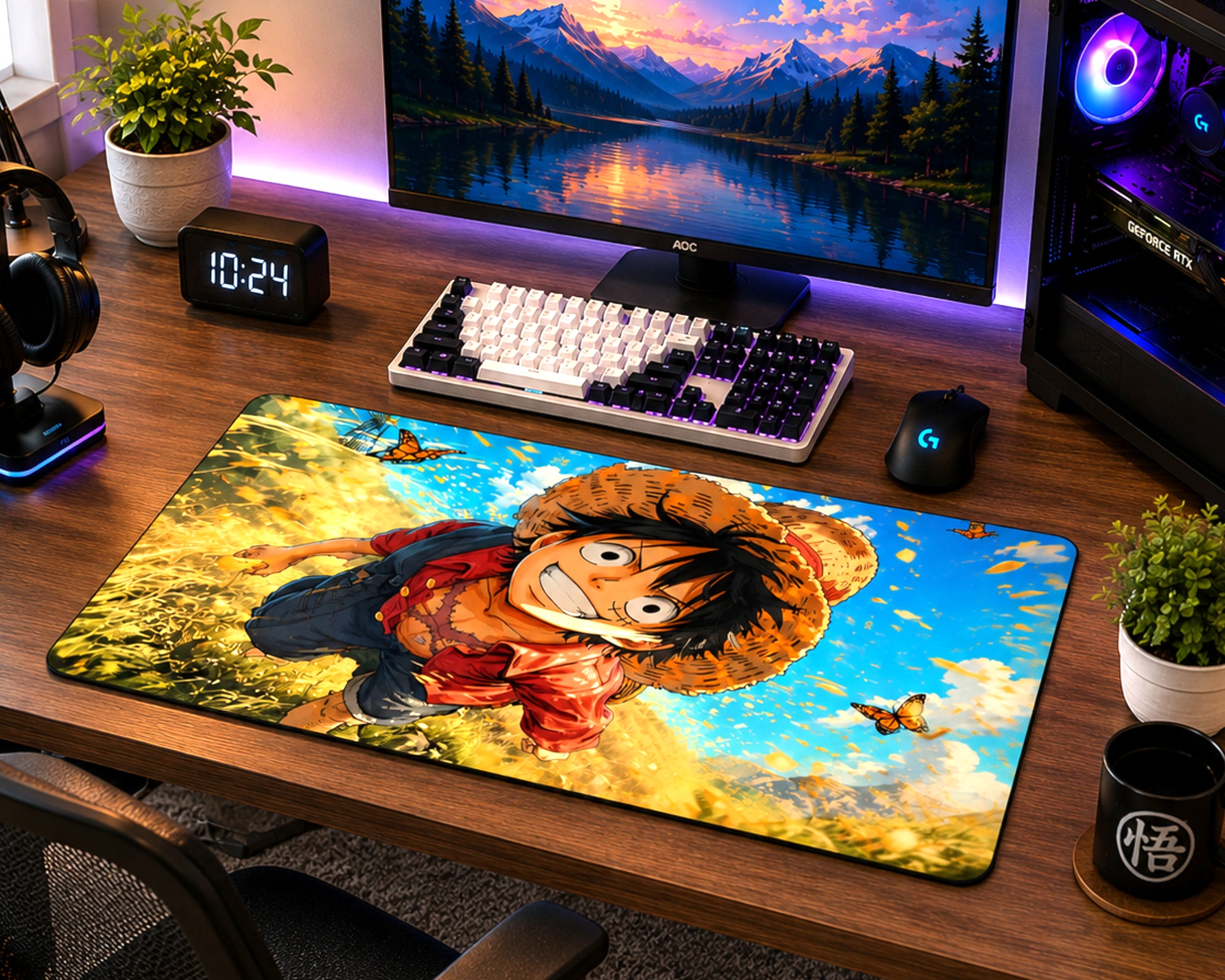 A large desk mat featuring an anime character print from One Piece, displayed on a wooden gaming desk alongside a keyboard, mouse, monitor, and plants.