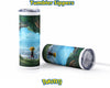 A clear plastic tumbler with a straw shown on a white background, printed with an anime-style landscape scene featuring a character in a yellow hat. The text 'Tumbler Sippers' appears at the top, and a 'PokéTCG' logo appears at the bottom.