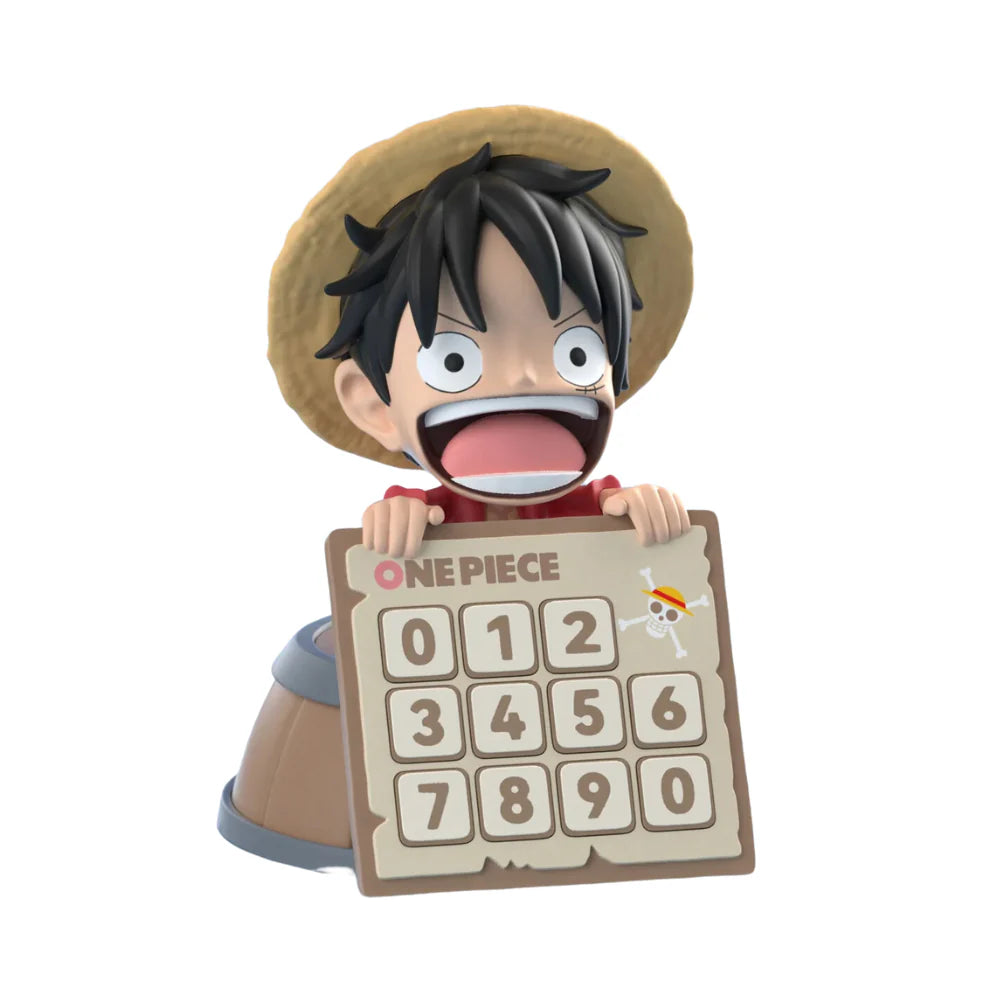 Figurine of a character from 'One Piece' holding a sign with numbers on a white background