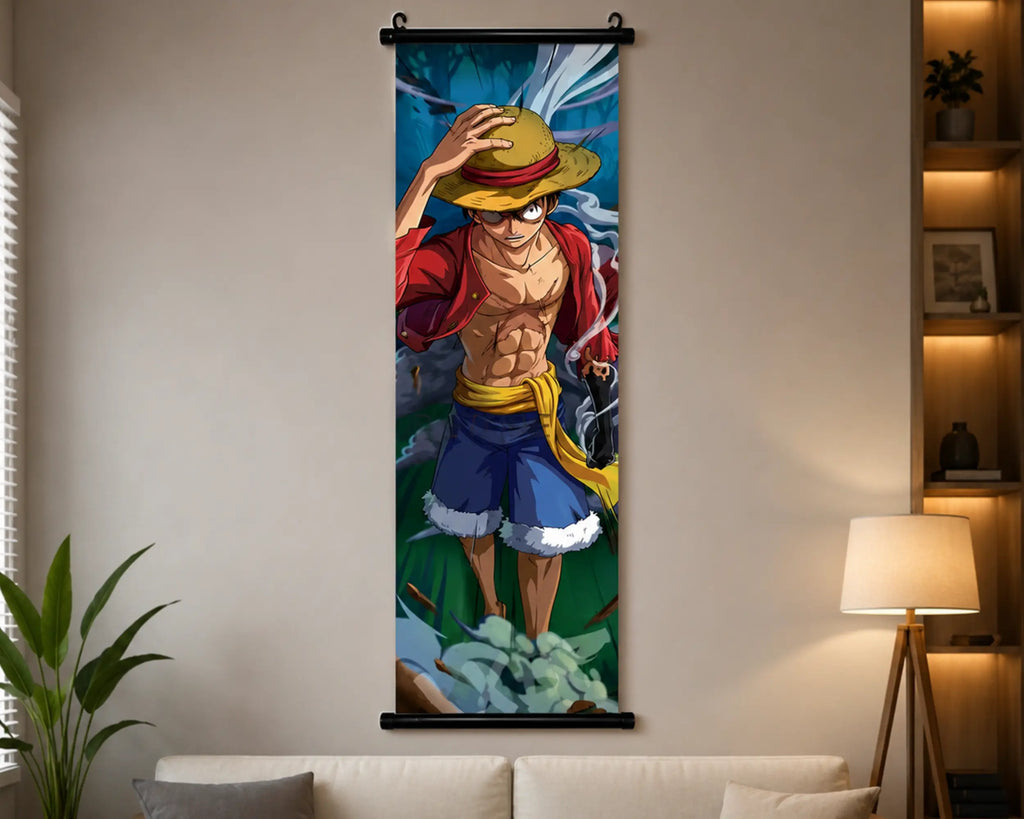 A vertical wall scroll poster featuring the anime character Monkey D. Luffy from One Piece, displayed hanging on a beige wall in a modern living room setting above a sofa with a lamp and plant nearby.