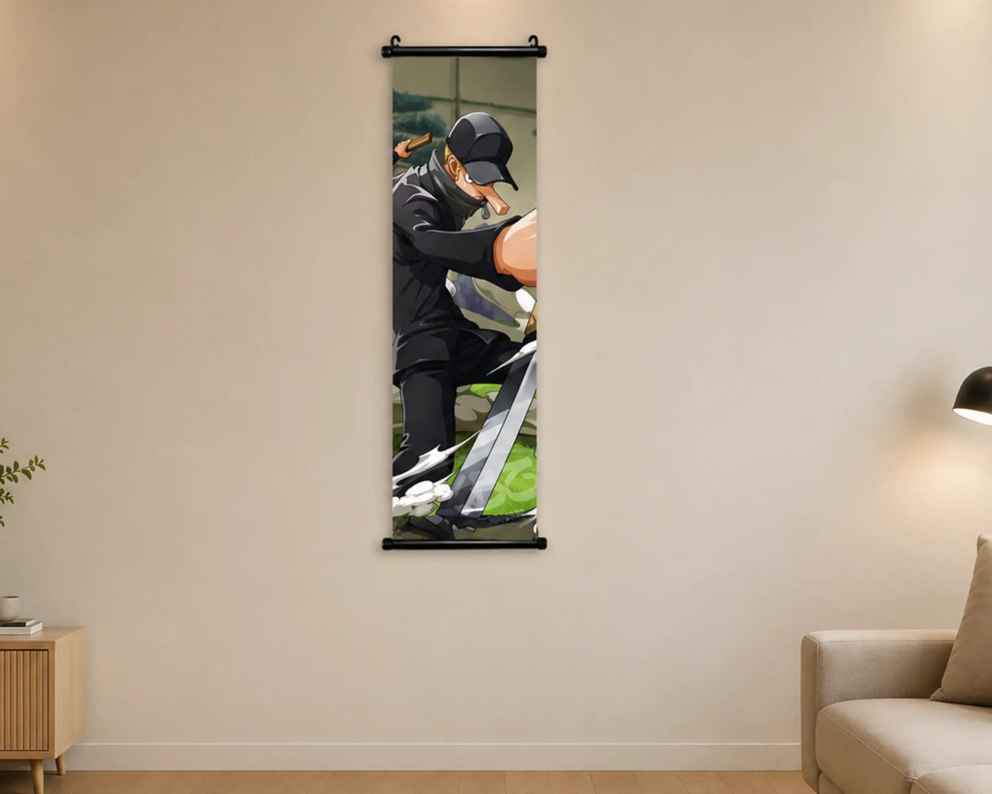 A vertical wall scroll poster hanging on a beige wall in a modern living room setting. The poster features a printed graphic of a man in a black tracksuit and cap working on a bicycle.