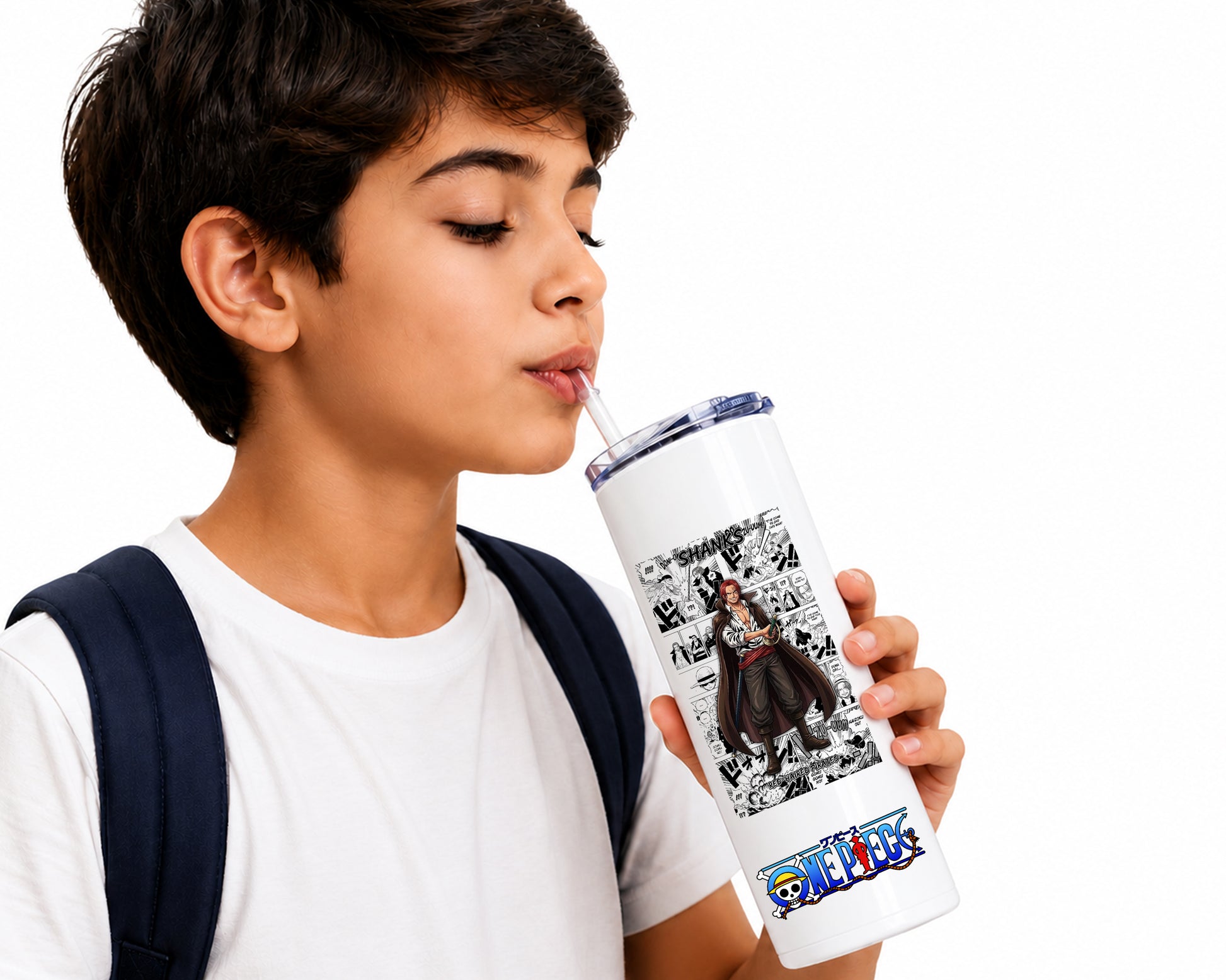 A young boy with short dark hair, wearing a white t-shirt and a navy backpack strap, is shown drinking from a white insulated tumbler with a clear straw. The tumbler features a black-and-white comic-style graphic of a superhero and a colorful 'SMOKY' logo at the bottom.
