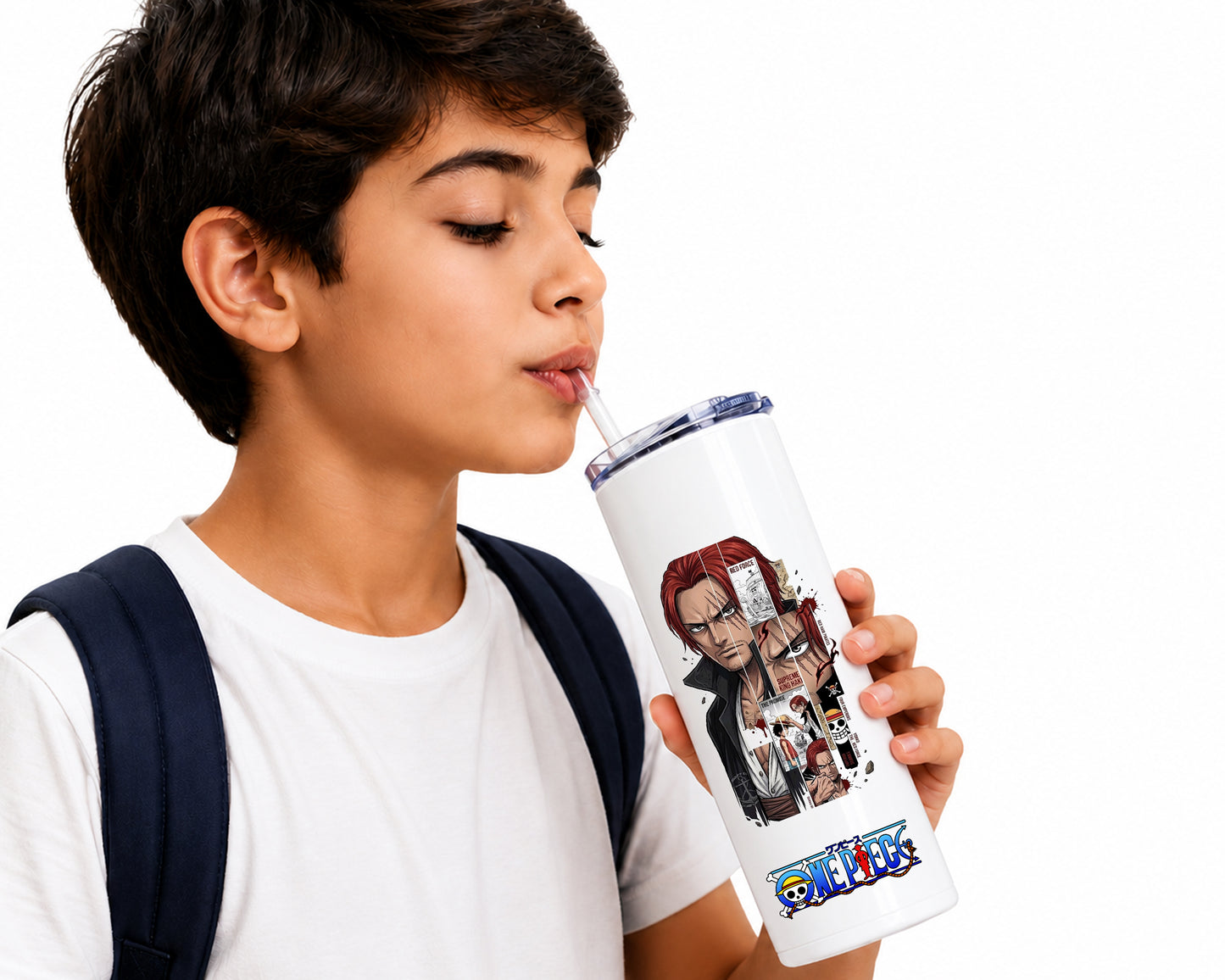 A young boy with dark hair, wearing a white t-shirt and a navy backpack strap, holds a white insulated tumbler with a clear lid and straw. The tumbler features a graphic print of characters from the anime series One Piece, including Sanji and Nico Robin, with the 'One Piece' logo at the bottom.