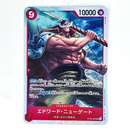 A Japanese character trading card featuring a muscular man with a white headband and cape, holding a large weapon, with the text '10000' at the top and Japanese character text at the bottom.