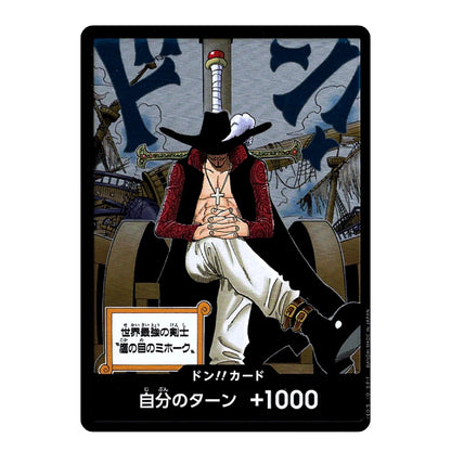 A collectible trading card featuring an illustrated character seated in a cannon, with Japanese text and the title 'Don!! Card' visible on the card.