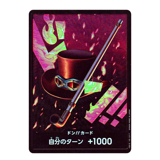 A collectible trading card featuring a stylized illustration of a brown top hat with a monocle and a smoking pipe against a dark background with neon pink and green abstract graphics. Japanese text is printed at the bottom.