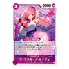 A Japanese character trading card featuring a pink-haired female anime character in a pink and white outfit against a purple background. The card has a pink border, a '2' in the top-left corner, '2000' in the top-right, and Japanese text with the name 'ヘンバートンバージアド' at the bottom.