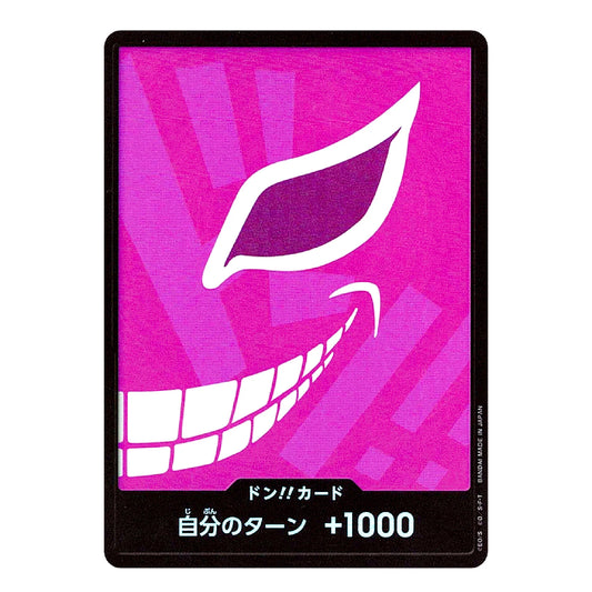 A Japanese don card game card with a bright pink and purple graphic of a stylized face, featuring white text at the bottom that reads '自分のターン +1000'.
