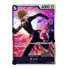 A single trading card featuring anime-style artwork of a blond character in a black suit running forward against a pink and purple sparkling background, with Japanese text and game-style counters visible on the card.