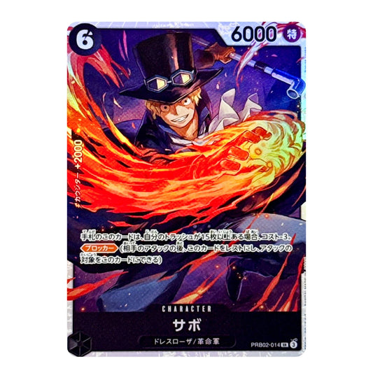 A single anime trading card featuring the character Sabo from One Piece, with a large orange and red flame effect behind him. The card has a holographic silver border, Japanese text, a power of 6000, and a 6 cost in the top corners.