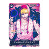 A character trading card featuring an anime-style illustration of a blonde character in a pink hoodie with heart patterns, holding a blue orb. The card has Japanese text, a '2' in the top-left corner, and '2000' in the top-right corner.