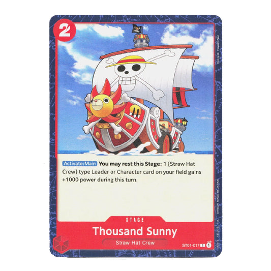 A single illustrated trading card featuring the Straw Hat Crew Thousand Sunny from One Piece. The card has a blue border, a red stage indicator, and artwork of a sailboat under a blue sky with clouds.