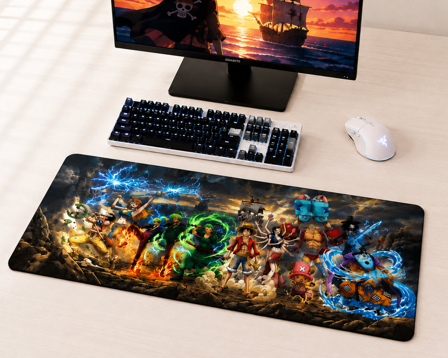A large rectangular gaming desk mat featuring a colorful anime battle scene with multiple characters, shown on a light wood desk next to a keyboard, mouse, and monitor.