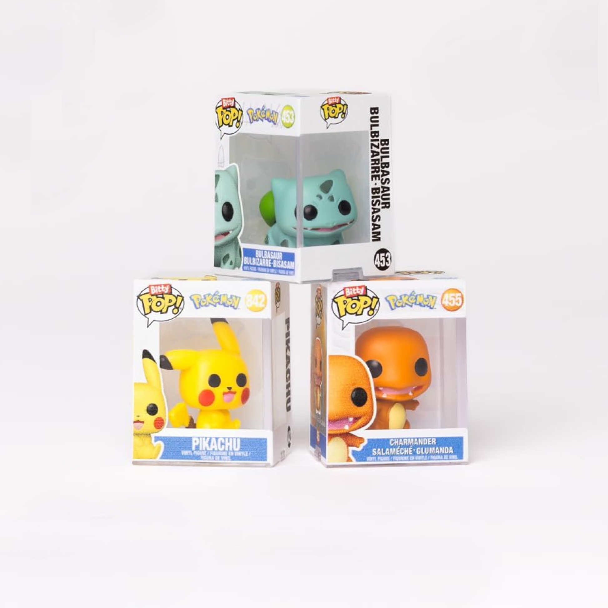Three Funko Pop! figures in packaging on a white background