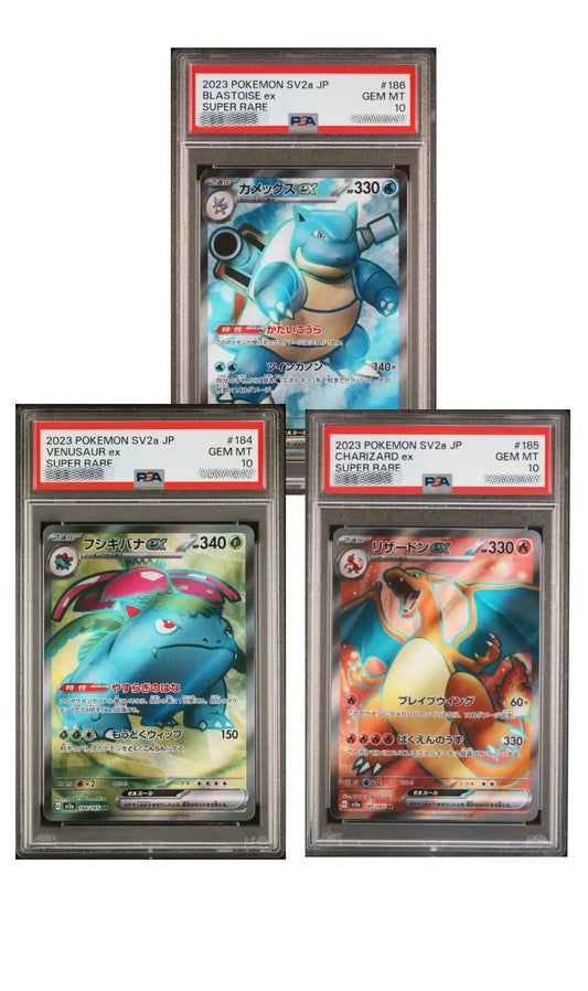 Three Pokémon trading cards in display cases with red labels on a white background