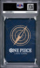A PSA graded One Piece Card Game deck box or card sleeve inside a clear plastic grading case, with a dark blue design and gold compass graphic.