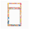 A decorative phone case or frame with a colorful floral and abstract pattern, shown on a plain light gray background.