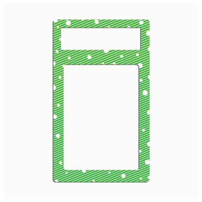 A rectangular green patterned frame or mat with rounded corners, featuring diagonal stripes, white dots, and a smaller horizontal cutout near the top, shown on a plain white background.
