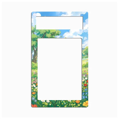 A rectangular picture frame with rounded corners, featuring a colorful painted border of a meadow with wildflowers, green trees, and a blue sky with white clouds. The top section has a smaller blank white insert area, and the main body has a larger blank white insert area.