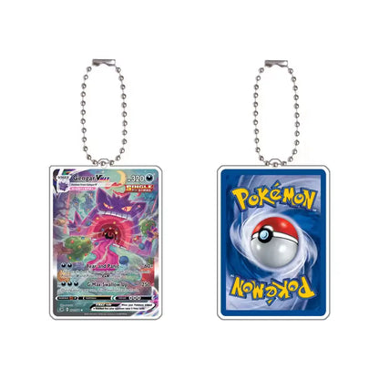 Two rectangular Pokémon card keychains shown side by side on a white background. The left keychain features a colorful battle card with a ball chain, and the right keychain shows the blue Pokémon card back with a Pokémon Ball graphic and yellow logo.