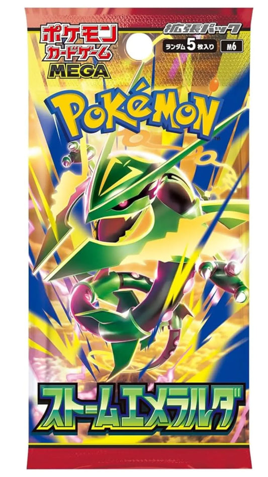A Pokémon Mega Storm Emerald card game booster pack featuring a colorful illustration of a green and purple Pokémon on a bright yellow and blue background with the Pokémon logo at the top.