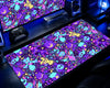 Pokémon Ghost Type Neon Chaos gaming mouse pad featuring colorful Gengar-inspired ghost characters, purple and cyan patterns, pink accents, yellow stars, and vibrant anime artwork on an extended desk mat.