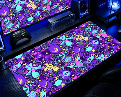Pokémon Ghost Type Neon Chaos gaming mouse pad featuring colorful Gengar-inspired ghost characters, purple and cyan patterns, pink accents, yellow stars, and vibrant anime artwork on an extended desk mat.