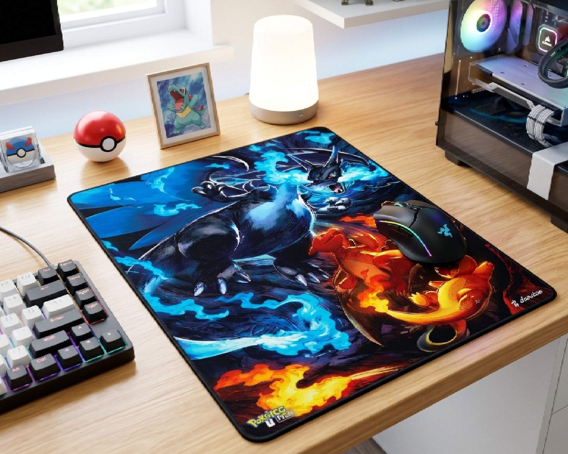 Mega Charizard X Pokémon gaming mouse pad with fiery anime artwork on a bright modern workspace setup featuring white wireless mouse and mechanical keyboard