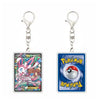 Two Pokémon-themed keychains shown side by side on a plain white background. The left keychain features a rectangular card with a colorful character illustration and a silver clasp.