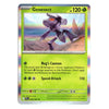 A holographic Pokémon TCG trading card of Genesect from the Paldean Fates expansion, featuring a silver holographic border and a green card body with artwork of the purple dragon Pokémon.