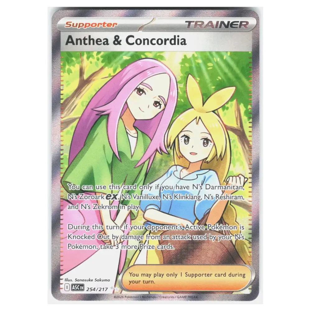 A Pokémon trading card titled "Anthea & Concordia" with illustrated characters on the front, photographed against a plain white background. The card has a holographic silver border and visible Pokémon branding at the top.