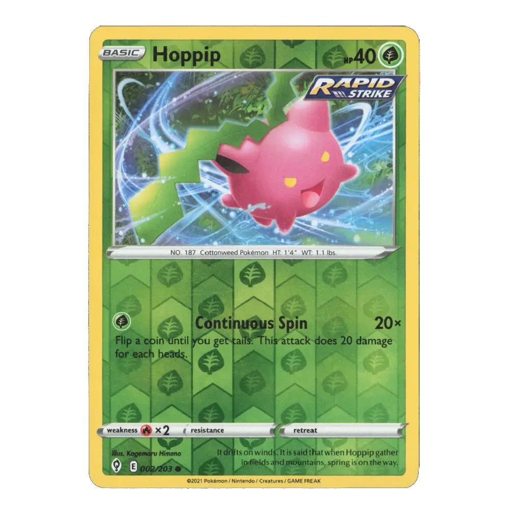 A single Pokémon trading card for Hoppip from the Basic Set, featuring a pink character in a blue-and-green action panel with a yellow border and green text box below.