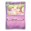 A single Alcremie Pokémon trading card shown against a plain white background. The card has a silver border, a purple header, and an illustration of the character Alcremie sitting at a red-and-white checkered picnic blanket.