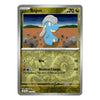 A single Pokémon trading card for Bagon from the Basic set, shown against a plain white background. The card features a silver border, a green-tinted patterned lower section, and artwork of a blue creature with gray hair in a rocky desert landscape.