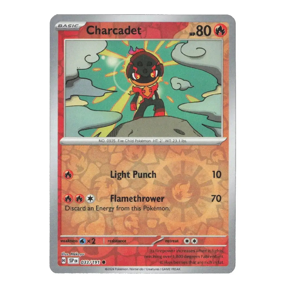 A Charcadet Pokémon trading card from the Basic set, featuring a red and orange design with an illustration of the character in the center.