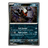 A single Pokémon trading card for Darkrai from the Basic set, shown against a plain white background. The card features artwork of the creature in a dark, moonlit scene with purple shadows, and text detailing its dark slumber and night cyclone abilities.