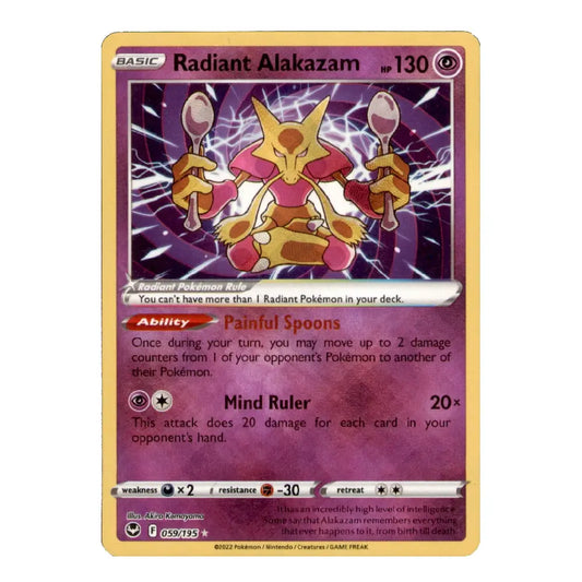 A single Pokémon trading card for Radiant Alakazam from the Basic Set, shown against a plain white background. The card has a gold border and features artwork of the Alakazam character in pink, purple, and gold tones.