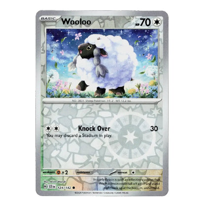 A single Pokémon trading card for Wooloo from the Basic set, shown against a plain white background. The card features a silver border, a central illustration of a fluffy white sheep with black legs and face, and game text including 'Knock Over' and HP 70.