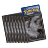 A set of Pokémon card sleeves or card backs in a dark metallic gray/black finish, with one sleeve standing upright in front showing a large silver-gray dragon illustration and the blue Pokémon logo at the top.