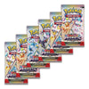 Six Pokémon Trading Card Game booster packs arranged in a staggered fan layout on a plain white background. The packs feature colorful character art and branding for Prismatic Evolutions.
