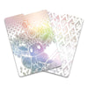 Two overlapping Pokémon TCG cards featuring Eevee, with one card showing a holographic pastel foil design and the other showing a white patterned back, on a clean white background.