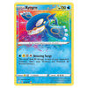 A single Pokémon trading card featuring Kyogre from the Basic set, with a colorful rainbow-splatter background and blue Kyogre artwork. The card includes attack text 'Amazing Surge' and a yellow border typical of Pokémon cards.