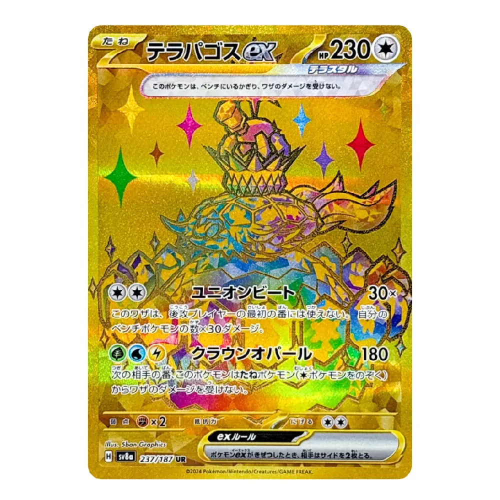 A holographic Pokémon trading card featuring the Terapagos EX card, with a dominant gold foil background and multicolored rainbow reflections across the artwork and text.